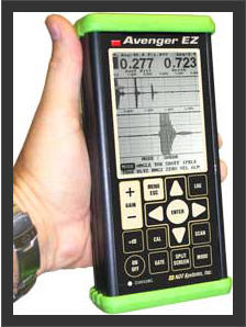 NDT Systems Avenger EZ Ultrasonic Flaw Detector in hand with split screen function displayed